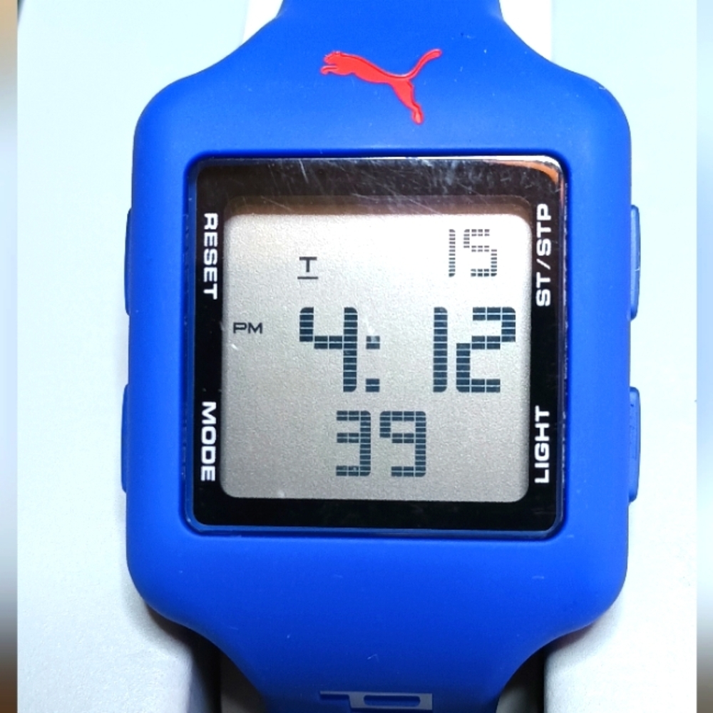 X Ladies Puma Sports watch, water resistant 5 bars, SS back, resin case, ureth